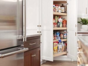 There’s nothing worse than losing a can of soup in the back of your pantry, only to rediscover it years later (expired, of course). Pull-out shelves are a game-changer, allowing you to see and access everything in an instant. Pro Tip: Use custom cabinet solutions with pull-out shelves for spices, dry goods, or cleaning supplies. Your back—and your expired soup—will thank you.